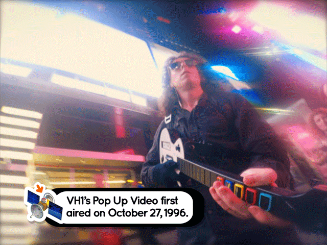 Jamie Brew being a guitar hero in Time Square for Botnik's I Don't Want To Be There video