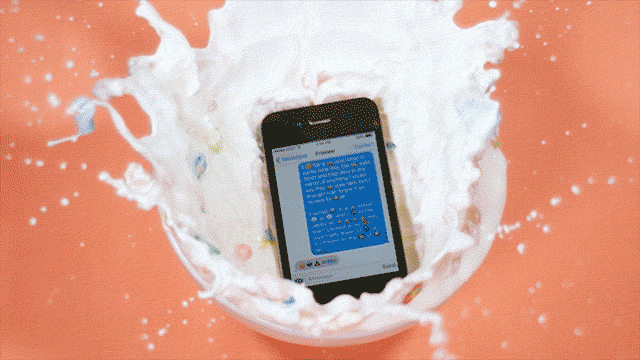 iPhone splashing down into cereal bowl with milk, from Mini Mansion's Double Visions video